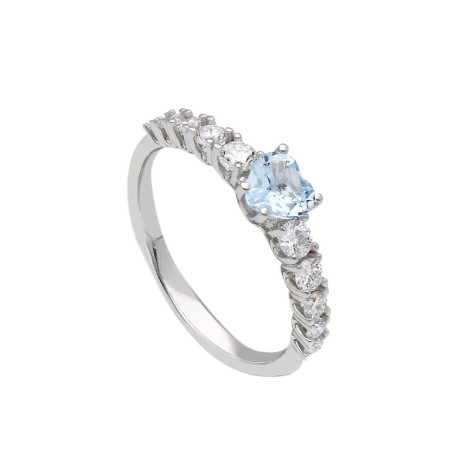 Anello in oro bianco 375/°°° con topazio azzurro e diamante lab-grown