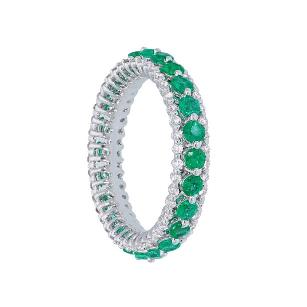 Anello eternity in oro bianco 750/ooo con diamanti naturali e smeraldo