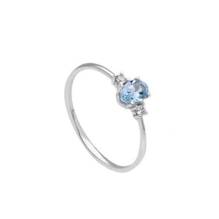 Anello in oro bianco 375/ooo zirconia cubica e topazio azzurro