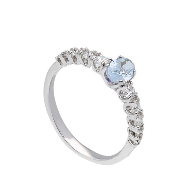 Anello in oro bianco 375/°°° con topazio azzurro e diamante lab-grown
