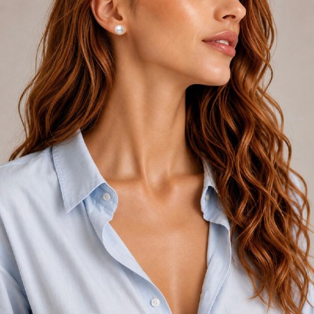 Orecchini lobo in oro bianco 750/°°° e perla