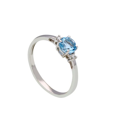 Anello in oro bianco 375/ooo con topazio azzurro e diamante naturale