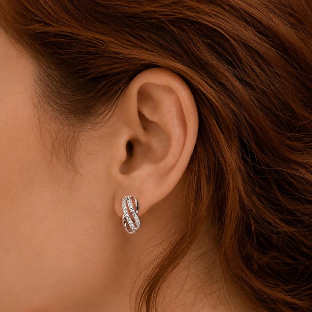 Orecchini in oro bianco 375/°°° e diamante