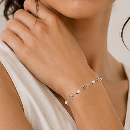 Bracciale in oro bianco 750/°°° e perle con cuori